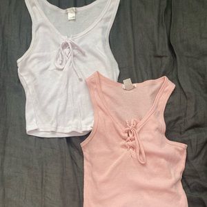 set of two lace up cropped tanks